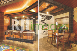 Area bar dengan dekorasi industrial dan Paduan unsur kayu & aksen industrial